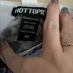 Sheer white top with skulls and floral design